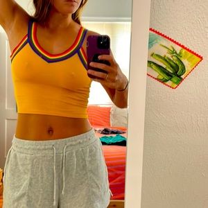 Heart & Hips yellow crop top, rainbow detailed edges.